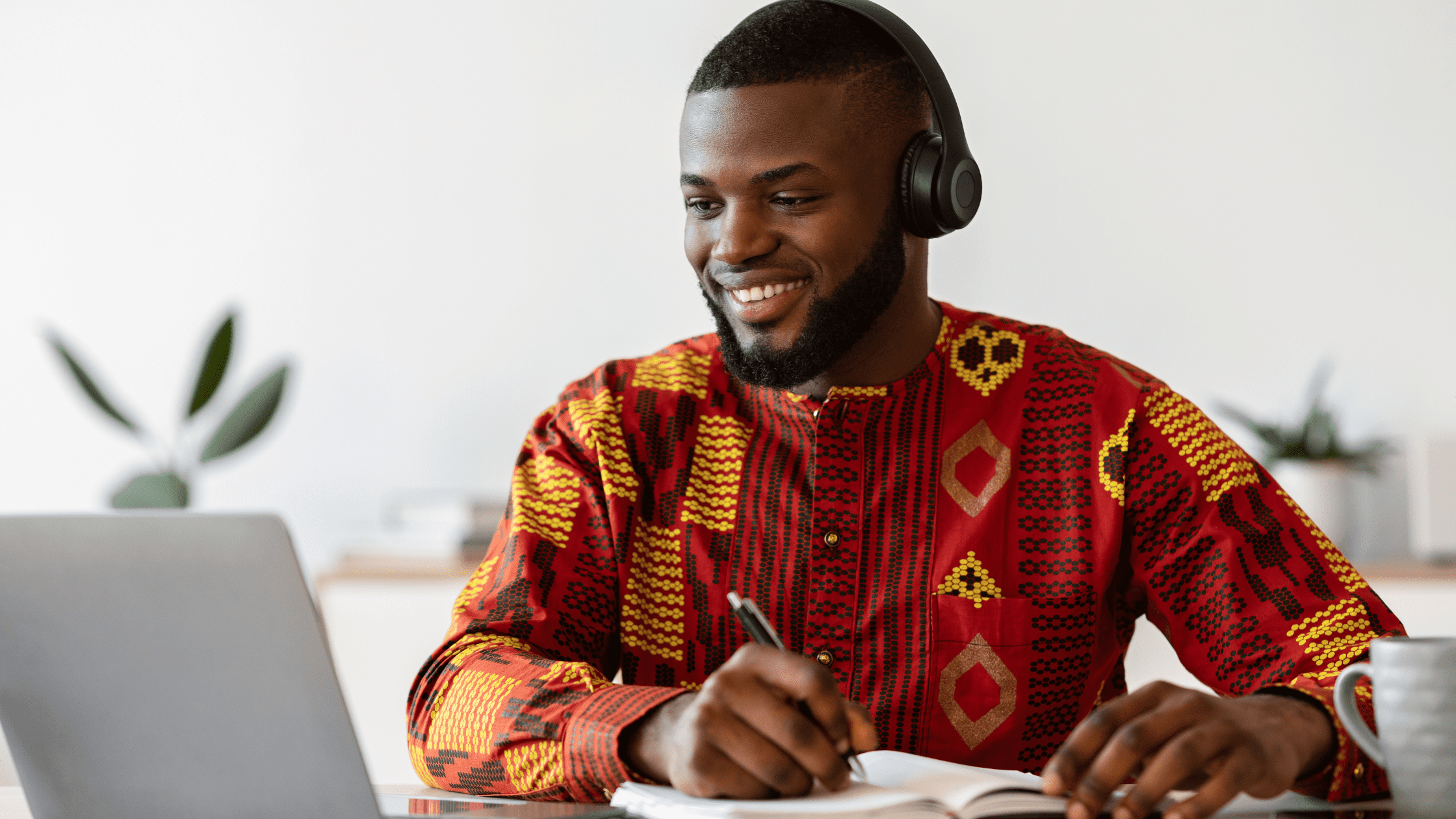A medical school student studying for the USMLE Step 2 CK in front of a laptop at home.